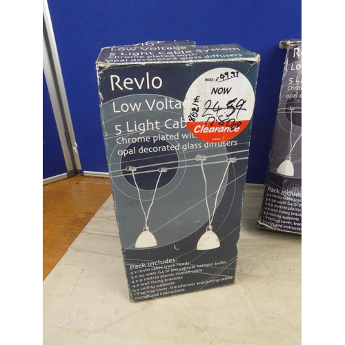 1126 - Four boxed Revlo ceiling lights.