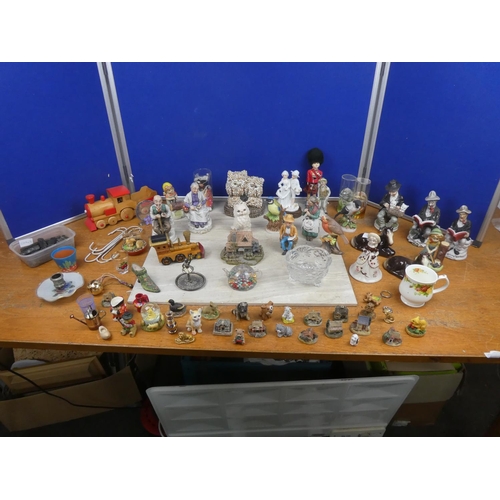 1132 - A collection of miniature ornaments, two wooden trains and lots more.