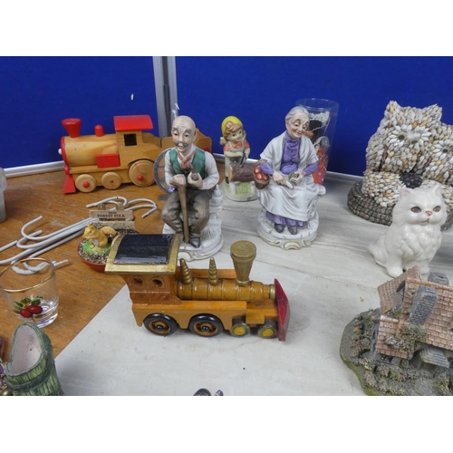 1132 - A collection of miniature ornaments, two wooden trains and lots more.