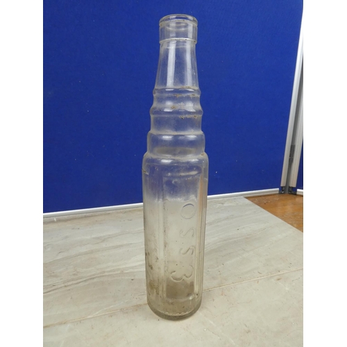 1146 - A vintage Esso oil bottle.