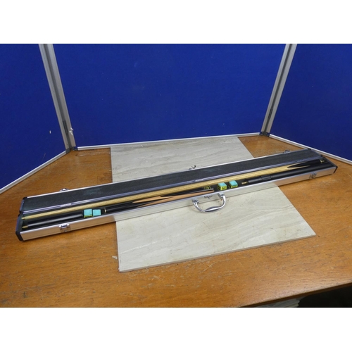 1154 - A metal cased handmade snooker cue made by Luos.