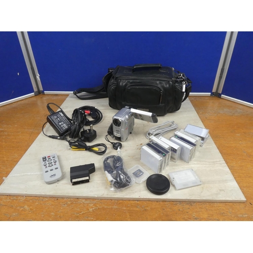 1157 - A vintage JVC movie camera, accessories and bag.