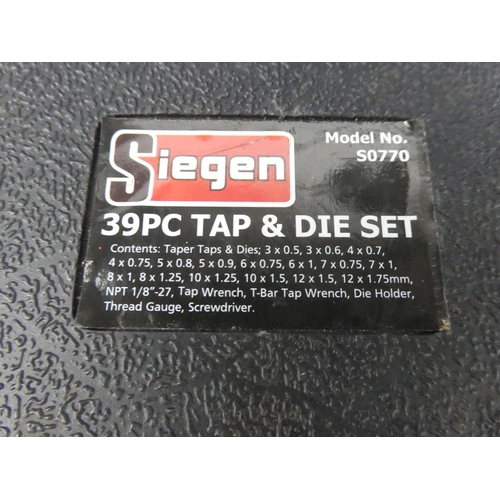 1168 - A cased Siegen 39 piece tap and die set.