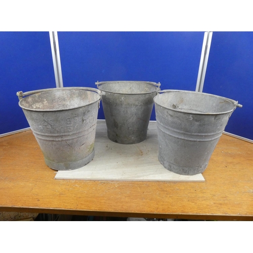 1176 - Three vintage galvanised buckets.