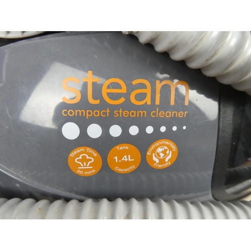 1185 - A Steam Compact Steam Cleaner.