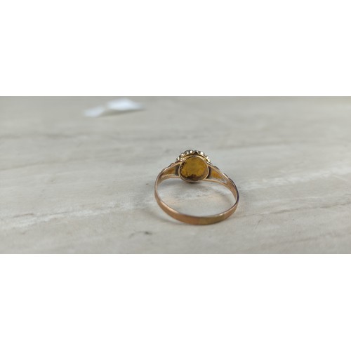 1003 - A stunning antique gold and amethyst dress ring.