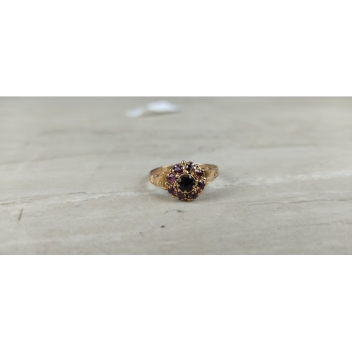 1003 - A stunning antique gold and amethyst dress ring.