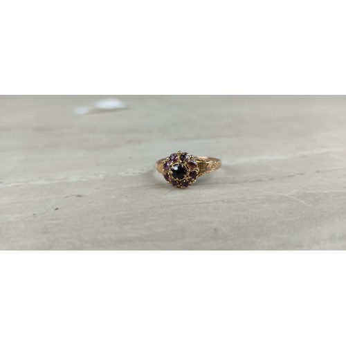 1003 - A stunning antique gold and amethyst dress ring.