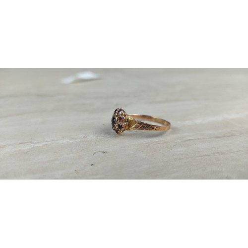 1003 - A stunning antique gold and amethyst dress ring.