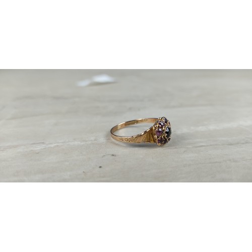 1003 - A stunning antique gold and amethyst dress ring.