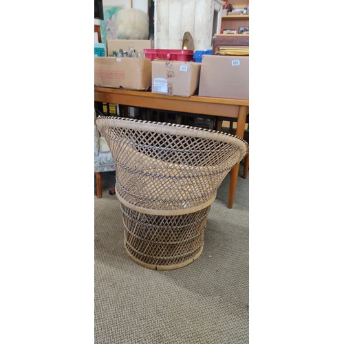 828 - A vintage rattan chair.