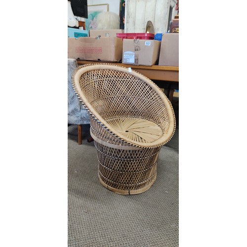 828 - A vintage rattan chair.