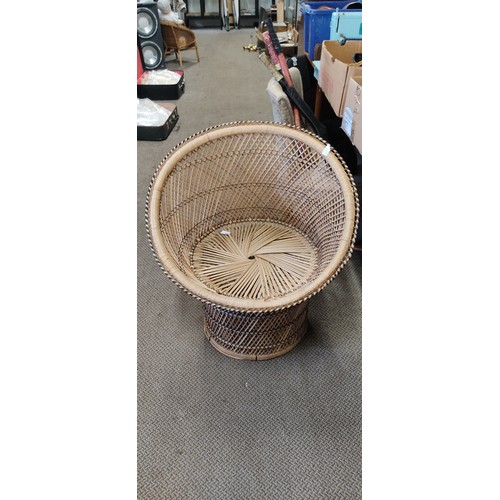 828 - A vintage rattan chair.