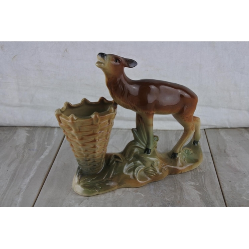 69 - A vintage Jema pottery figure of a deer and vase.  Approx 24cm.