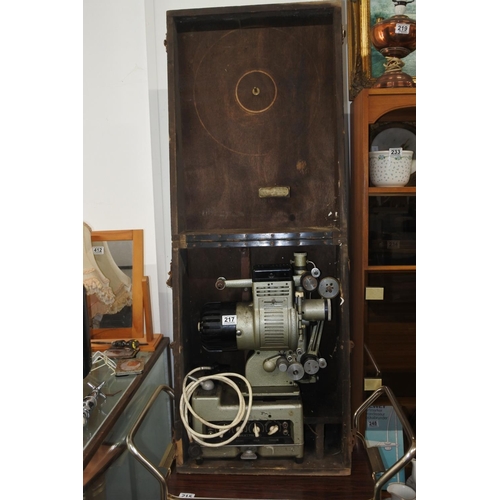 217 - A large vintage Debrie 16 projector in a wooden case, serial number 11485.