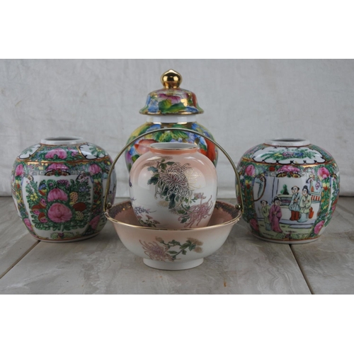 230 - A pair of oriental vases and more.