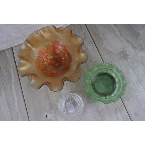 243 - A stunning carnival glass bowl and other glass ware.
