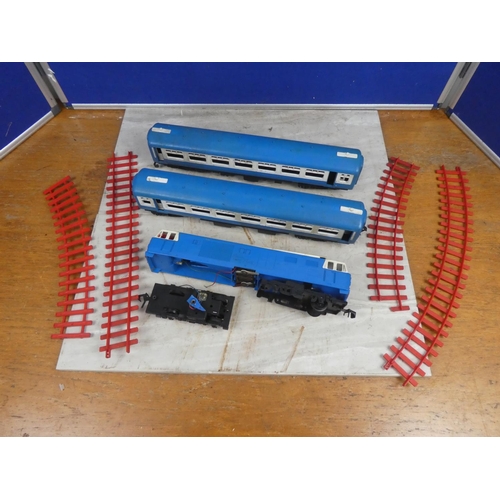 261 - A vintage Blue Liner toy train and some track (a/f)