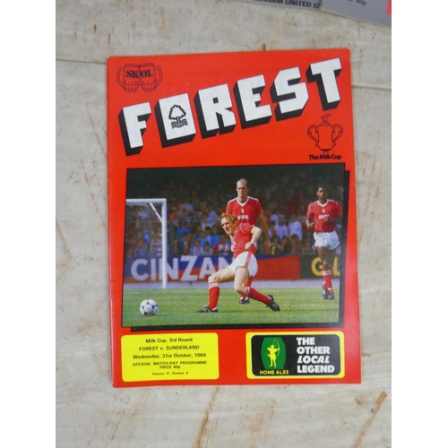265 - A large collection of vintage football programmes.