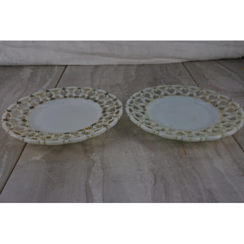 301 - Two antique milk glass plates.