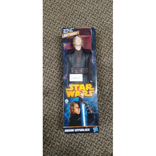 314 - A Hasbro Star Wars Anakin Skywalker action figure in original packaging.