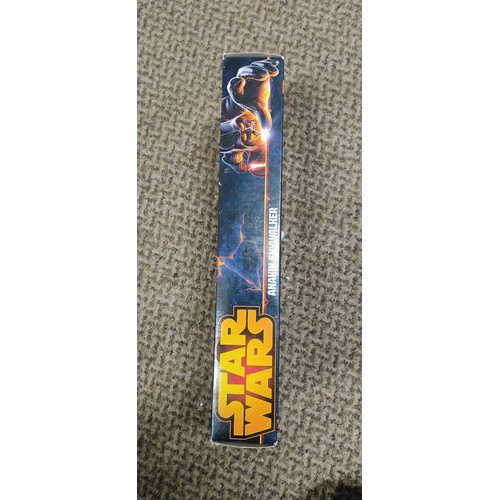 314 - A Hasbro Star Wars Anakin Skywalker action figure in original packaging.