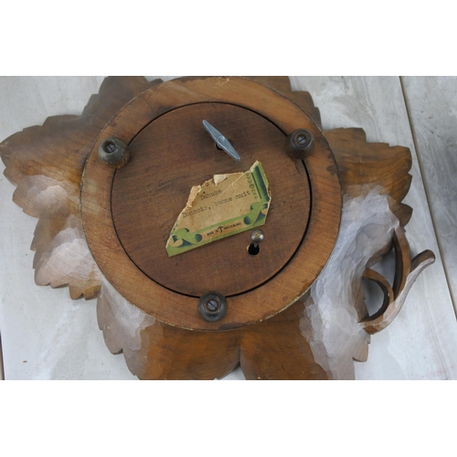 319 - A wooden musical maple leaf dish and a musical jewellery box, both made in Switzerland.