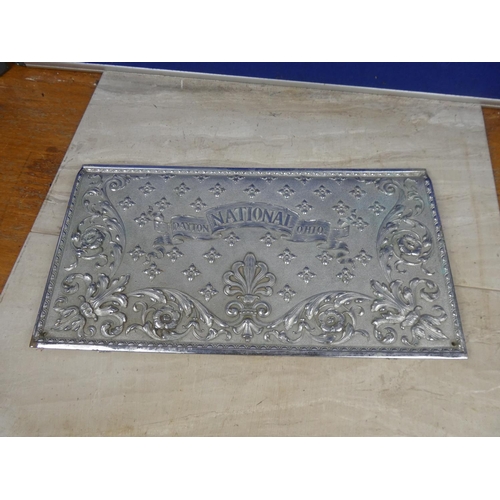 426 - A decorative metal panel from an antique National Dayton OH10 cash register. Approx 47x25cm.