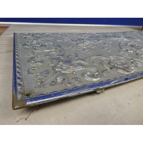 426 - A decorative metal panel from an antique National Dayton OH10 cash register. Approx 47x25cm.