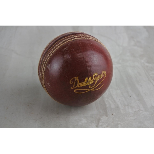 31 - A vintage leather Royal Crown hand sewn cricket ball.