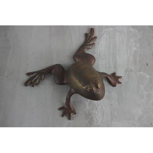 32 - A vintage brass frog.