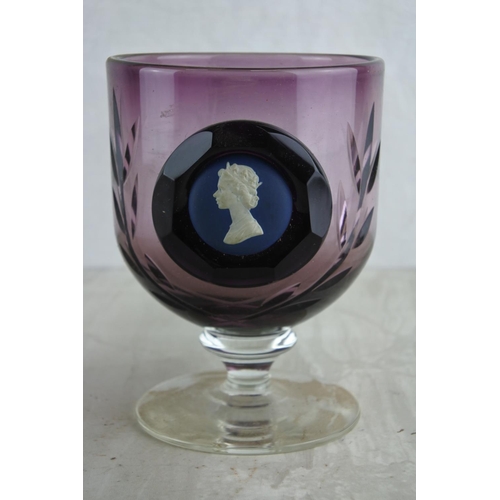 39 - A stunning antique cranberry glass goblet with ceramic panel of Her Majesty Queen Elizabeth II. Appr... 
