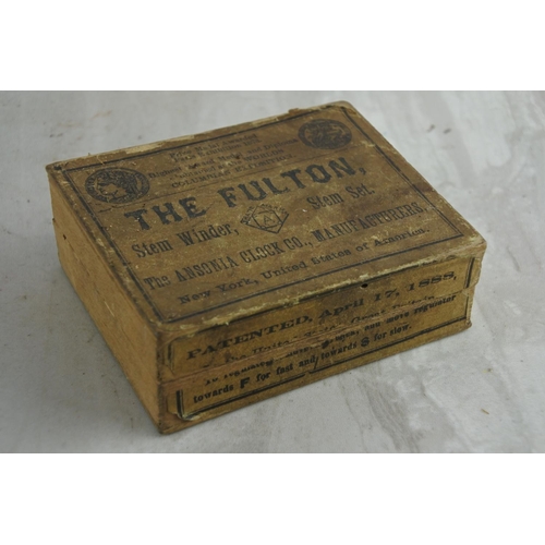 40 - A small antique wooden box 'The Fulton, The Ansonia Clock Co' and assortment of keys.