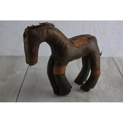 45 - A vintage hand stitched leather horse.