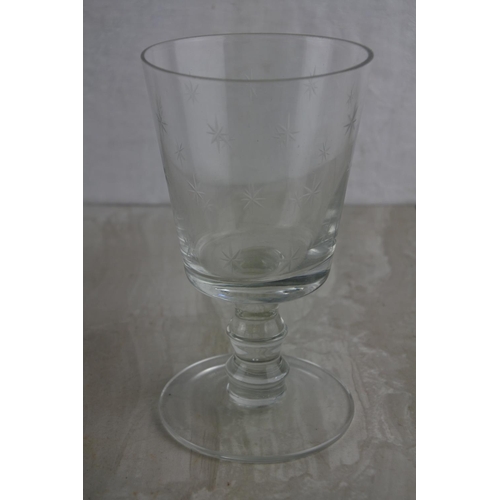 52 - A stunning antique rummer glass with decorative design. Approx 14cm.