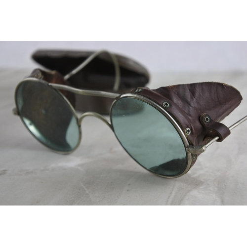 58 - A cased pair of WW2 RAF pilot sunglasses.