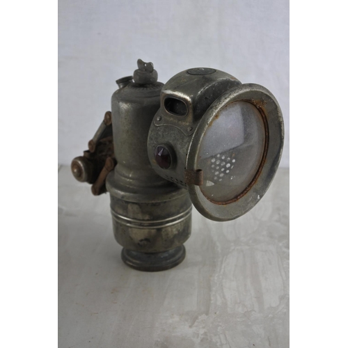 70 - An antique carbide bicycle lamp by Powell and Hanmer Ltd.