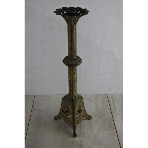 71 - A stunning antique French brass Church candlestick. Approx 42cm.