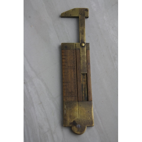 80 - An antique miniature brass and wooden ruler by maker J Rabone & Sons, Birmingham.