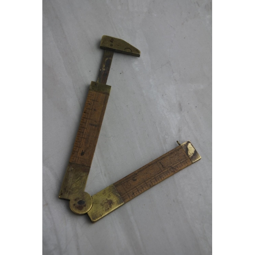 80 - An antique miniature brass and wooden ruler by maker J Rabone & Sons, Birmingham.