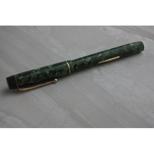 88 - A vintage Summit fountain pen with 14kt gold nib.