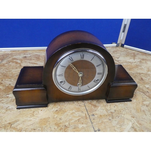 628 - A Westminster chiming clock with key.  Approx 45x28x12cm.