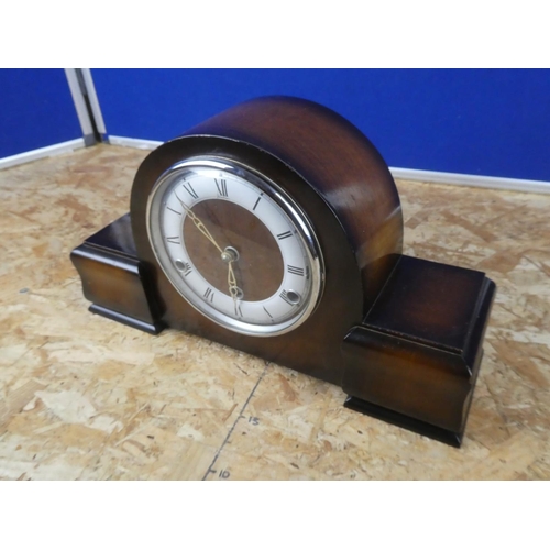 628 - A Westminster chiming clock with key.  Approx 45x28x12cm.