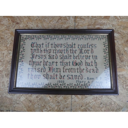 629 - An early framed sampler signed Mary A Gibson 1888.  Approx 52x33cm.