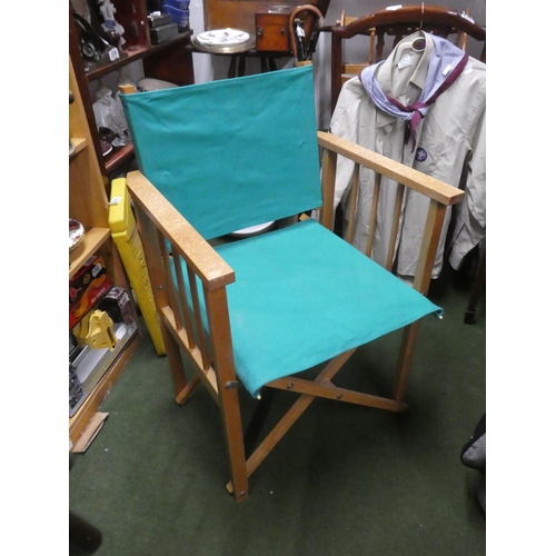 633 - A directors style folding chair.