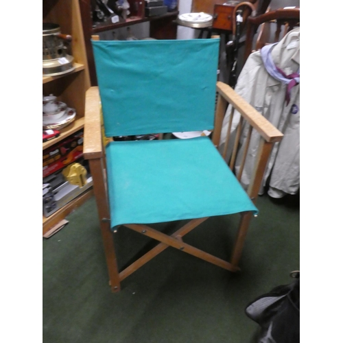 633 - A directors style folding chair.