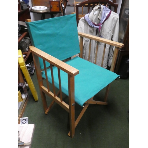 633 - A directors style folding chair.