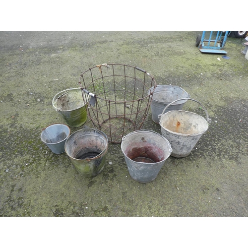 637 - A large lot of vintage buckets and a large wire basket.