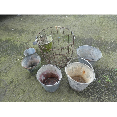 637 - A large lot of vintage buckets and a large wire basket.