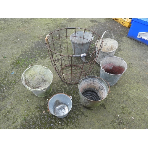 637 - A large lot of vintage buckets and a large wire basket.